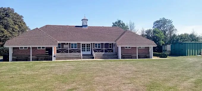 Joscas School sports pavilion, a single-storey building with a clock tower