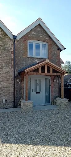 Oak-framed porch on a stone cottage